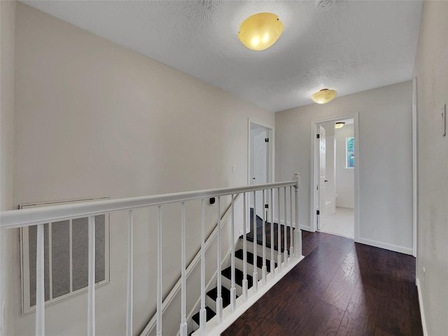 14718 W Bend Dr, Houston, TX 77082 - hall with an upstairs landing, dark wood finished floors, and baseboards