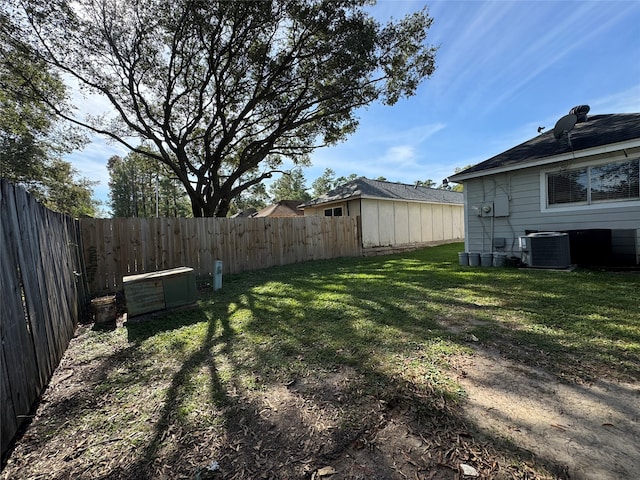 view of yard with central AC unit