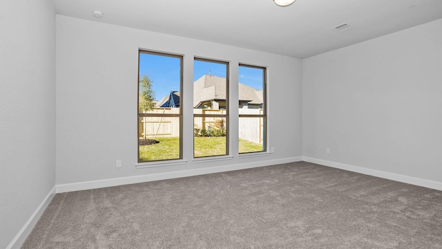 view of carpeted spare room