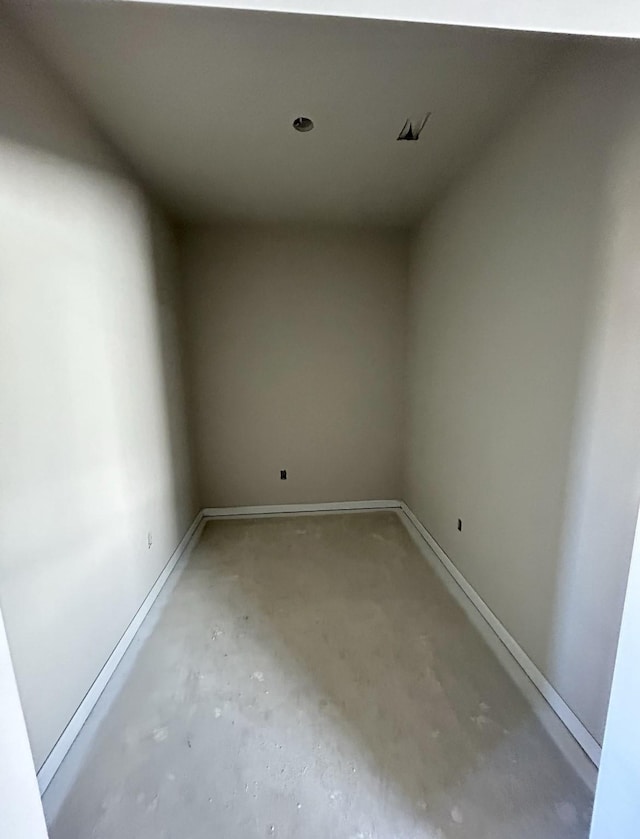 spare room featuring concrete floors