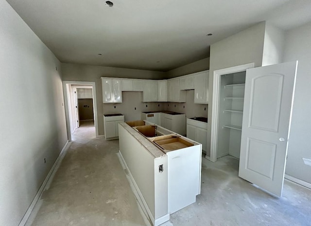 kitchen with white cabinets and a kitchen island