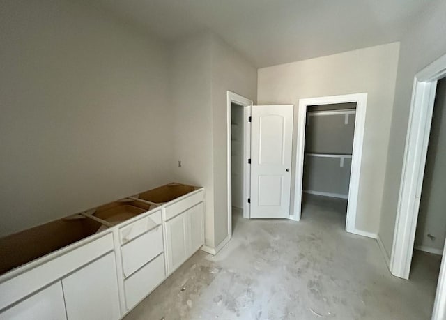 bathroom featuring concrete floors