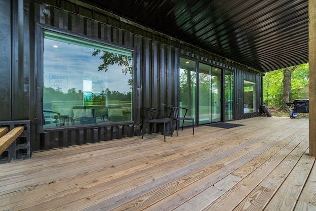 wooden terrace with grilling area