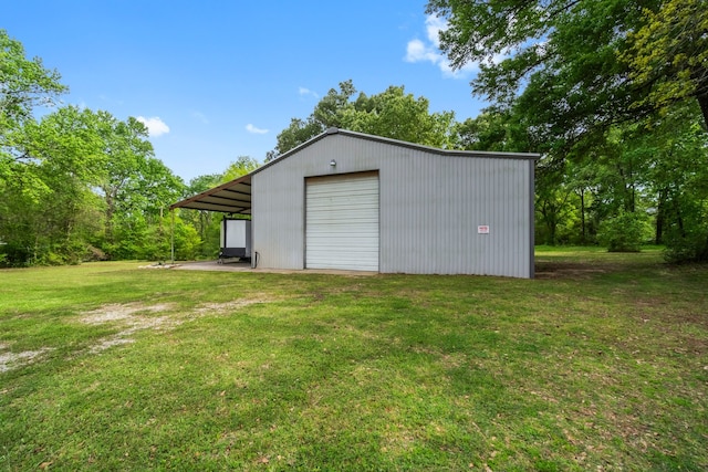 garage with a yard