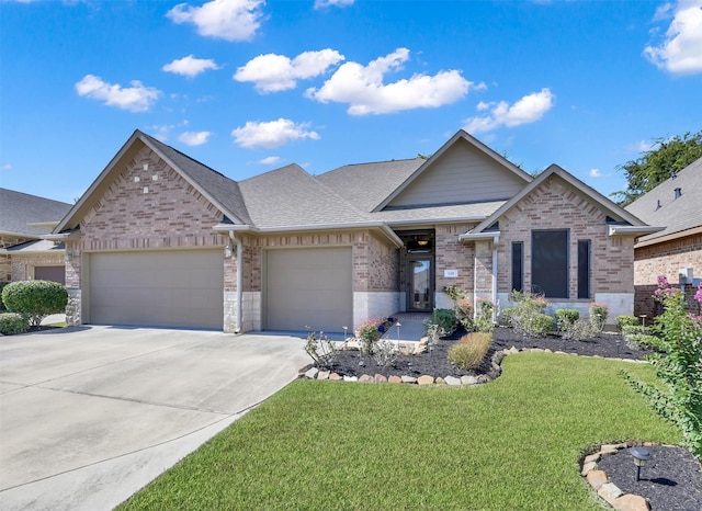 view of front of home featuring a front lawn and a garage