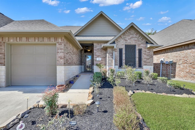 view of front of property featuring a garage