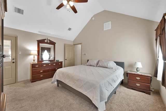 carpeted bedroom featuring ceiling fan and lofted ceiling