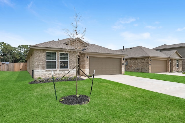 ranch-style house with a front lawn and a garage