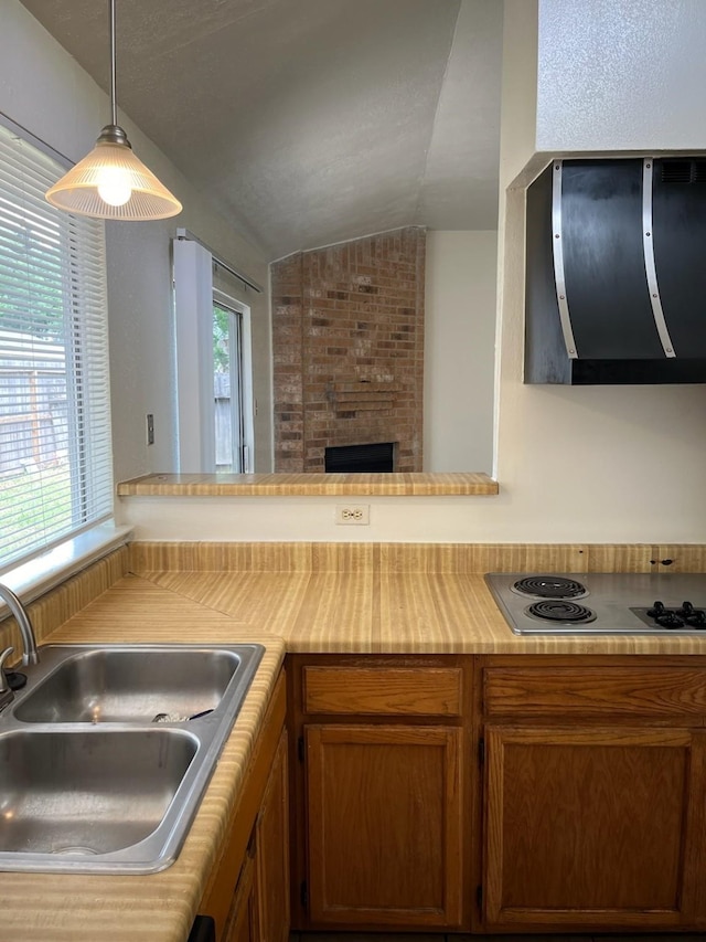 10506 Twilight Moon Dr, Houston, TX 77064 - kitchen with ventilation hood, a sink, lofted ceiling, light countertops, and stainless steel electric stovetop