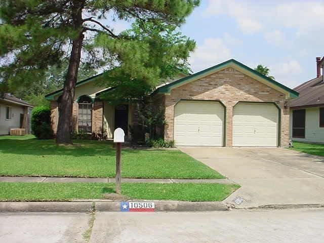 10506 Twilight Moon Dr, Houston, TX 77064 - ranch-style house featuring concrete driveway, a garage, a front yard, and brick siding