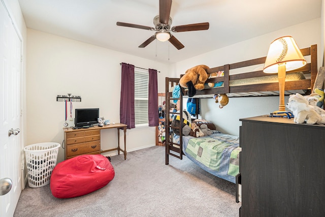 bedroom featuring ceiling fan and light colored carpet