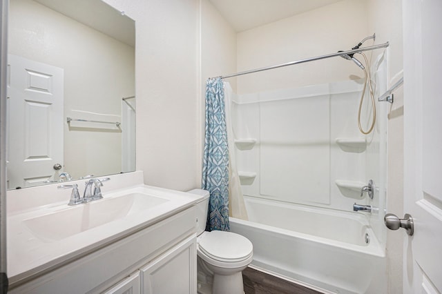 full bathroom with vanity, toilet, hardwood / wood-style flooring, and shower / bath combo