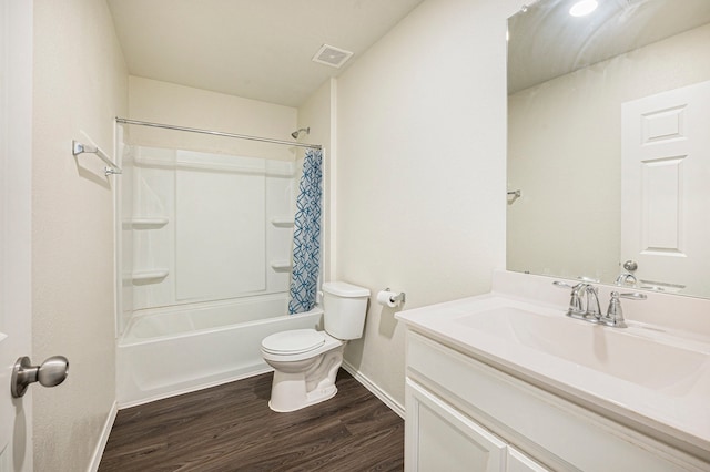 full bathroom with toilet, shower / tub combo with curtain, vanity, and wood-type flooring