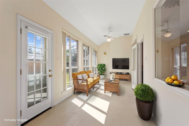 sunroom featuring ceiling fan