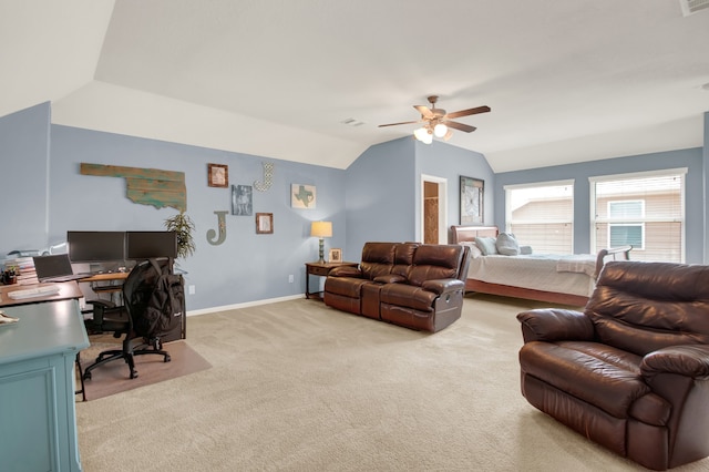 office with ceiling fan, vaulted ceiling, and light colored carpet