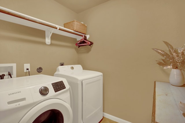 washroom featuring independent washer and dryer