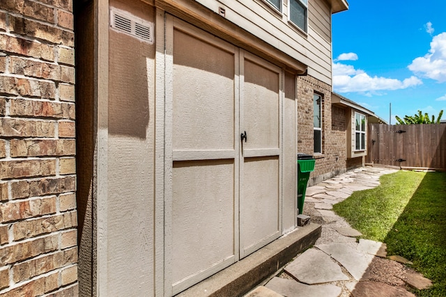 view of property exterior with a yard