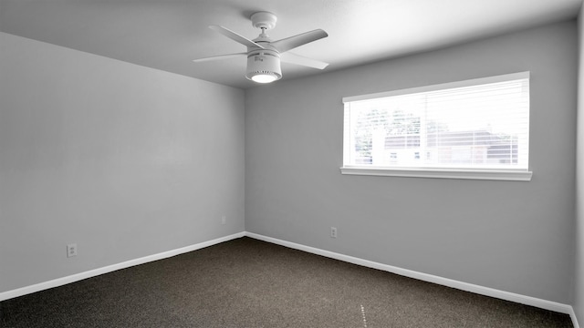 empty room with carpet flooring and ceiling fan