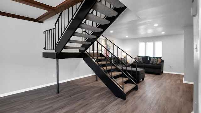 staircase featuring wood-type flooring