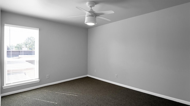 empty room with carpet flooring and ceiling fan