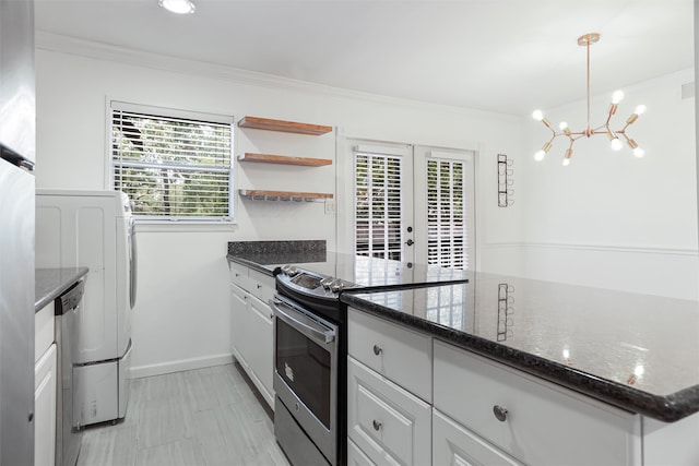 kitchen with white cabinetry, an inviting chandelier, crown molding, pendant lighting, and appliances with stainless steel finishes