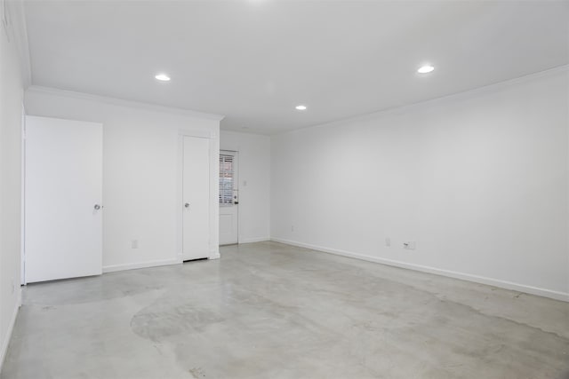 unfurnished room featuring ornamental molding