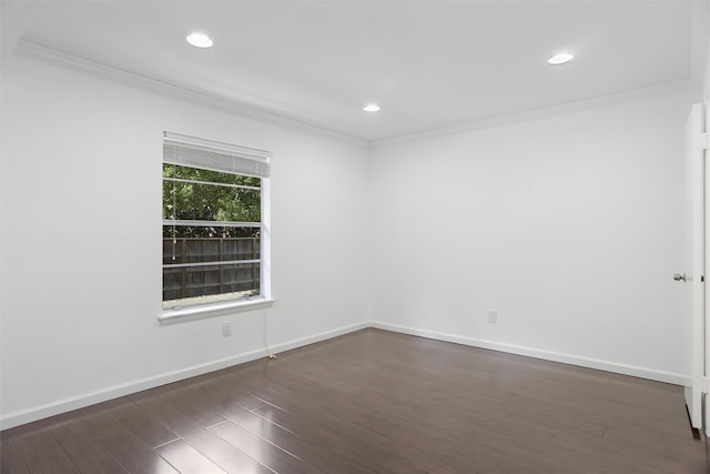 unfurnished room featuring dark hardwood / wood-style flooring and ornamental molding