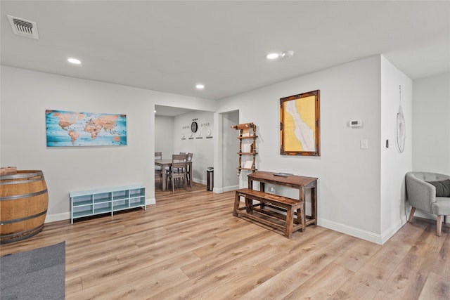 sitting room featuring light hardwood / wood-style floors