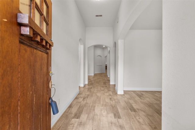 corridor featuring light wood-type flooring