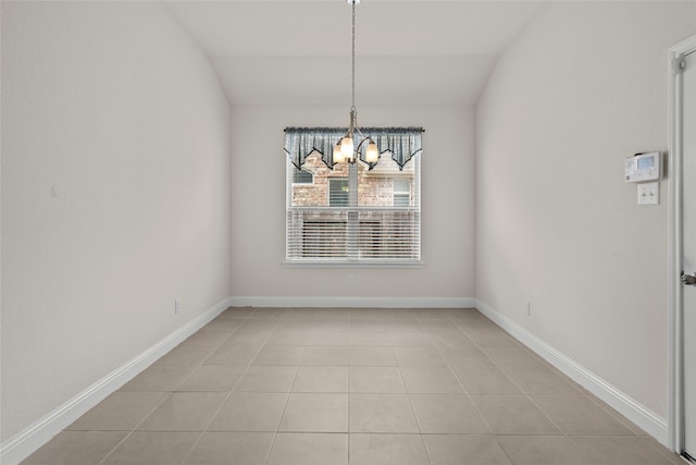 unfurnished dining area featuring lofted ceiling, a chandelier, and light tile patterned floors