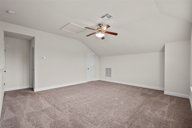 additional living space with lofted ceiling and carpet floors