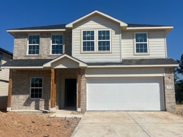 view of front of home with a garage