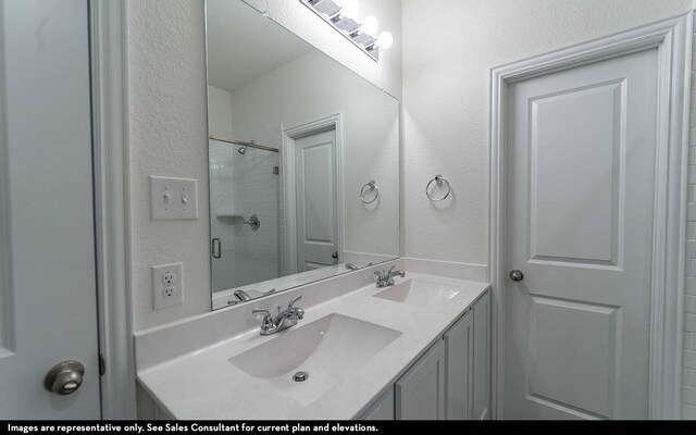 bathroom featuring vanity and walk in shower