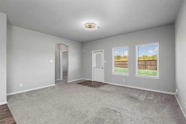 empty room featuring carpet flooring