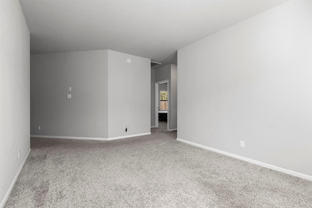 unfurnished room featuring carpet flooring