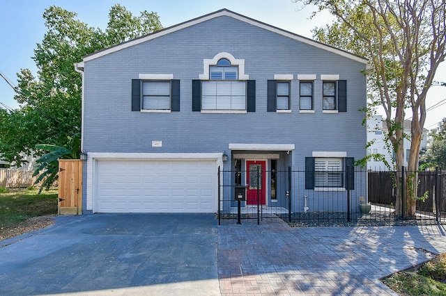 view of front of property featuring a garage