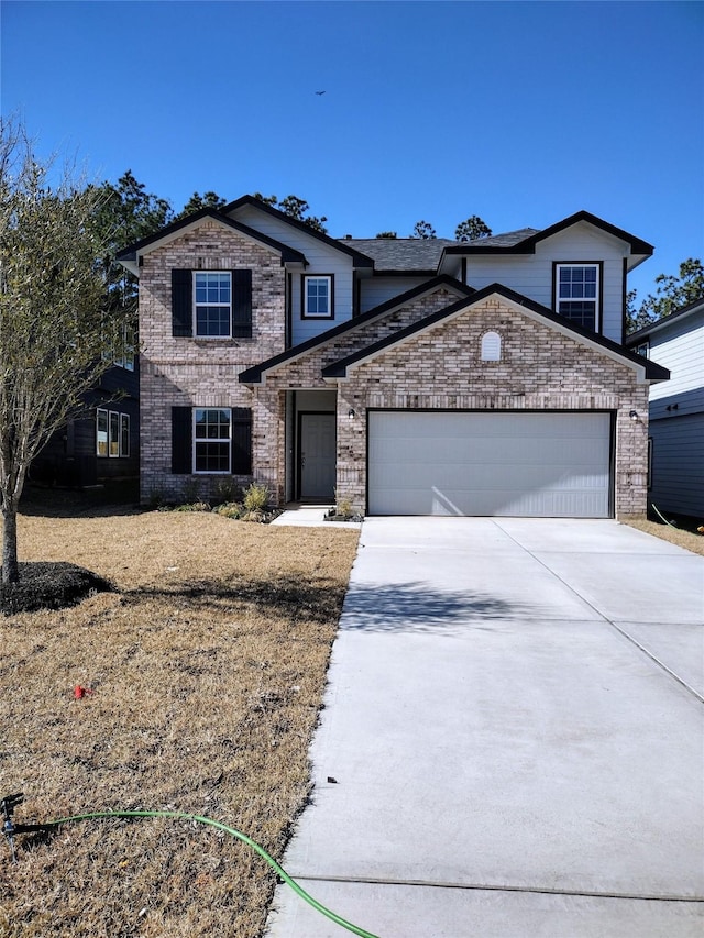 front of property featuring a garage