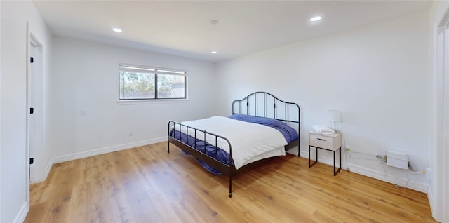 bedroom featuring light wood-type flooring