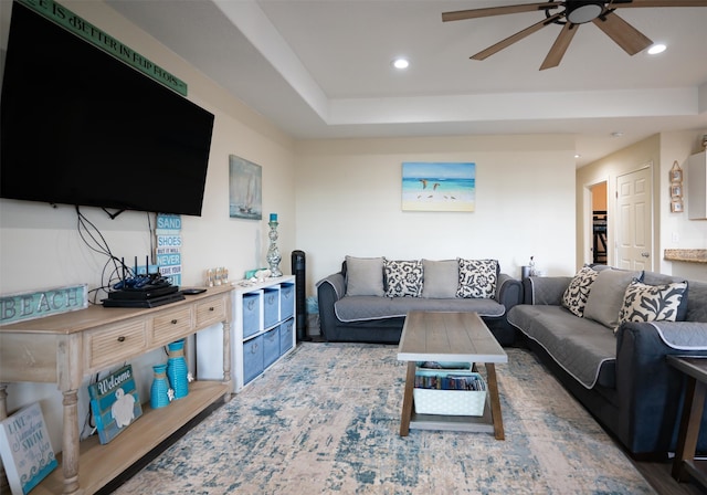 living room featuring ceiling fan