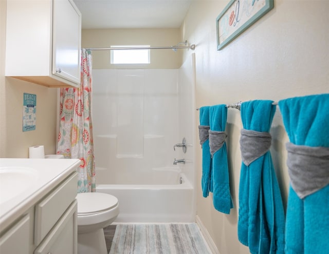 full bathroom with toilet, vanity, wood-type flooring, and shower / tub combo