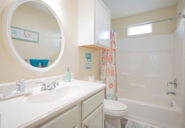 full bathroom with vanity, toilet, hardwood / wood-style flooring, and shower / tub combo