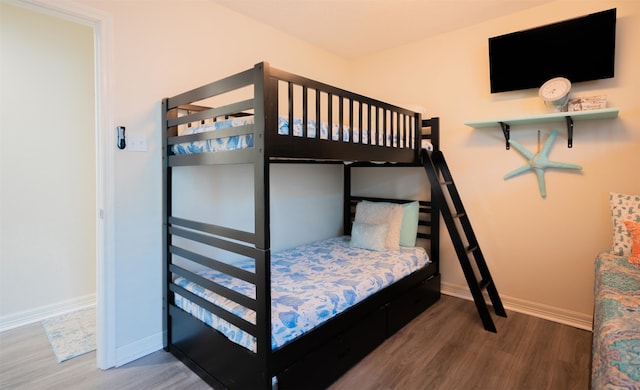 bedroom featuring hardwood / wood-style flooring