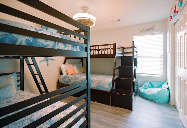 bedroom with light hardwood / wood-style floors