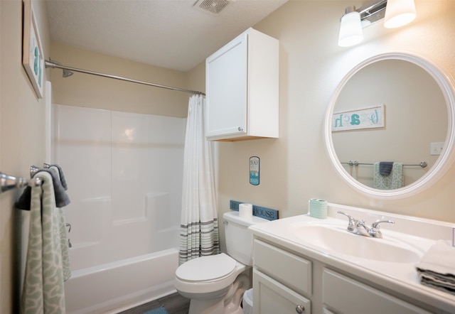 full bathroom with vanity, toilet, shower / bath combo with shower curtain, and hardwood / wood-style floors