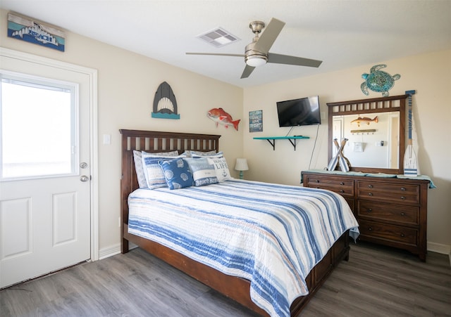 bedroom with ceiling fan and wood-type flooring