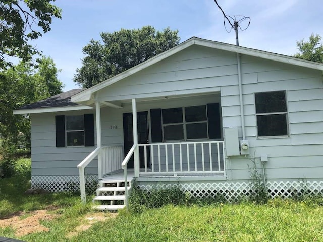 view of front of home featuring covered porch