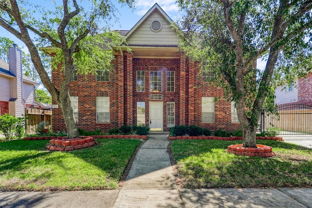 view of front of house with a front lawn