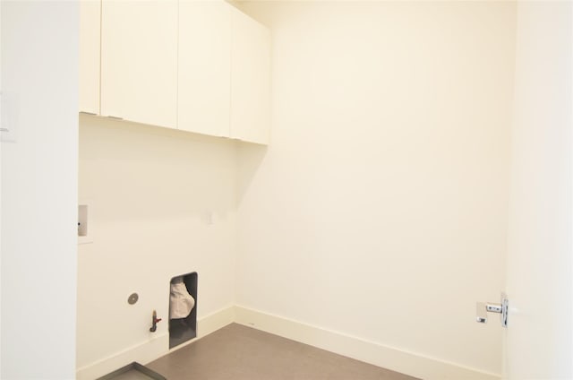 laundry area featuring washer hookup, hookup for a gas dryer, and cabinets