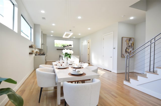 dining space featuring light hardwood / wood-style floors