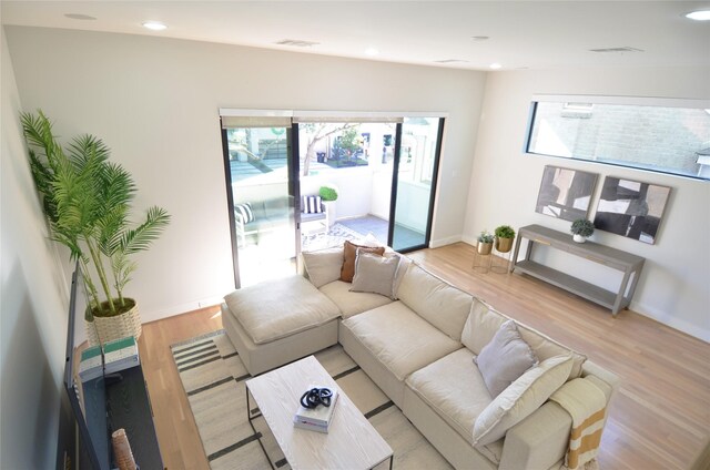 living room featuring light wood-type flooring